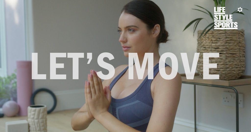 30 second 4k.mp4.00_00_03_17.Still001 life style sports commercial with a lady doing yoga on screen
