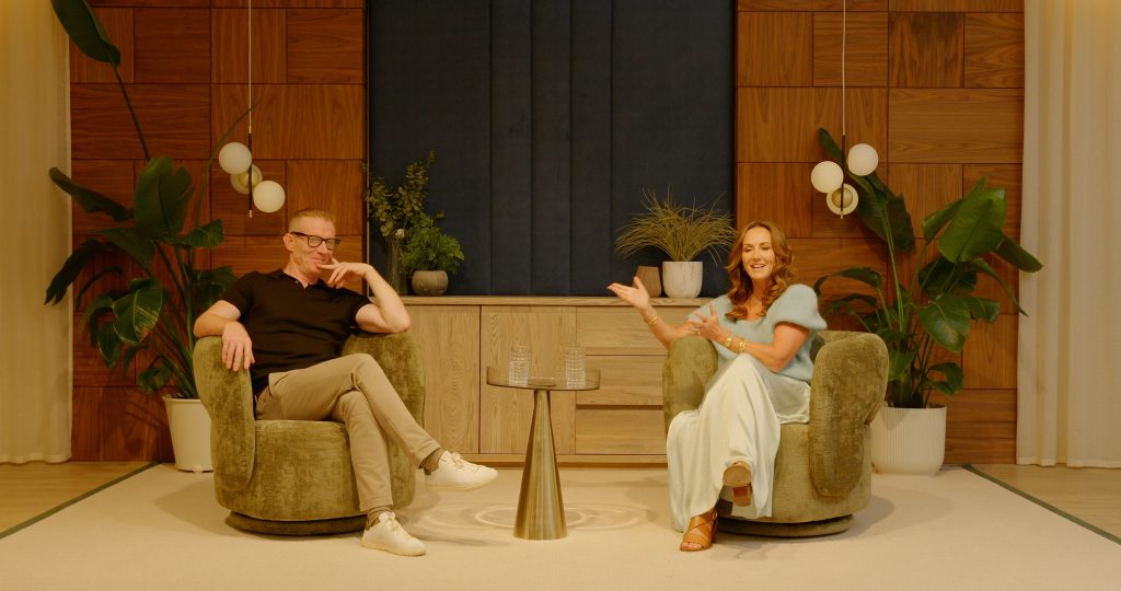 Lorraine Keane and Tom Coleman shooting a podcast in a furniture store